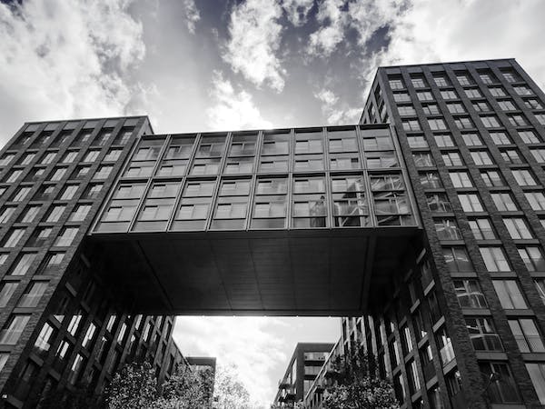 a black and white photo of a tall building